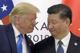 President Donald Trump, left, met with Chinese President Xi Jinping during a meeting on the sidelines of the G-20 summit in Osaka, Japan, on June 29. 