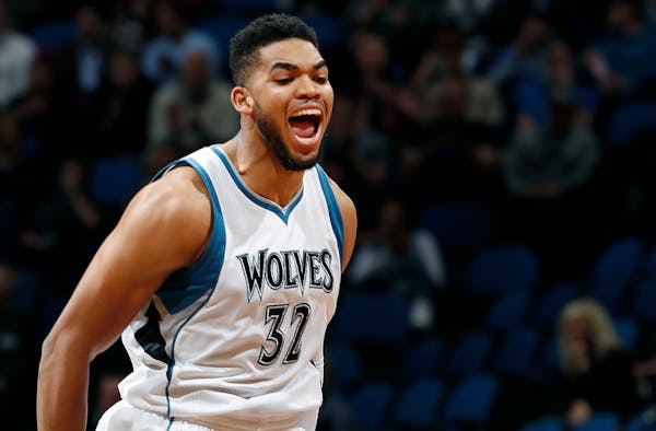 Karl-Anthony Towns celebrated after making a shot in the first quarter.