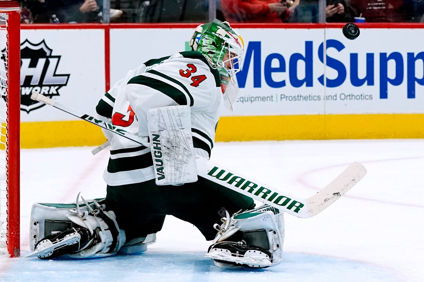 Minnesota Wild goaltender Kaapo Kahkonen makes a save against the Arizona Coyotes during the first period of an NHL hockey game Wednesday, Nov. 10, 2021, in Glendale, Ariz. The Wild won 5-2. (AP Photo/Ross D. Franklin)