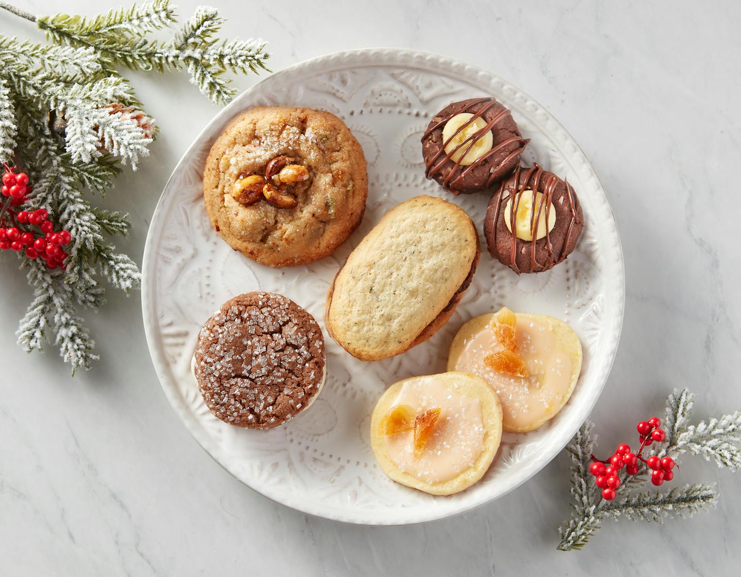 The winning cookies of the 2023 Star Tribune Holiday Cookie Contest. Center, Earl Grey Butter Cookies with Dark Chocolate and Orange Filling (the winner), and finalists: Good Thai Dings, Nanaimo Bar Thumbprint Cookies, Aperol Sparklers and Ginger Chocolate Bliss. Photo: Dennis Becker, Food styling: Lisa Golden Schroeder