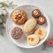 The winning cookies of the 2023 Star Tribune Holiday Cookie Contest. Center, Earl Grey Butter Cookies with Dark Chocolate and Orange Filling (the winn
