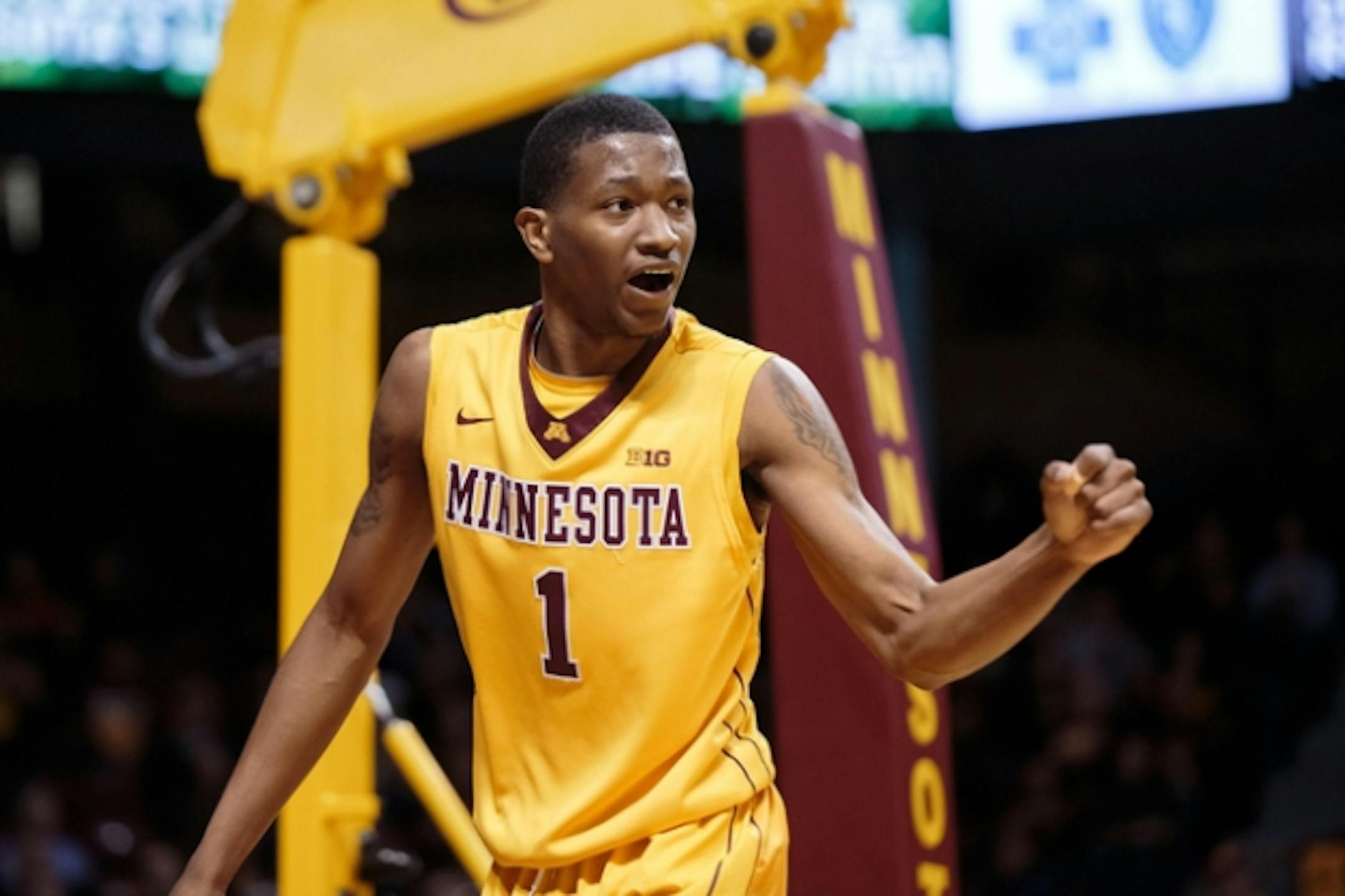 Dec 8, 2015; Minneapolis, MN, USA; Minnesota Gophers guard Dupree McBrayer (1) celebrates his basket in the second half against the South Dakota State Jackrabbits at Williams Arena. Mandatory Credit: Brad Rempel-USA TODAY Sports