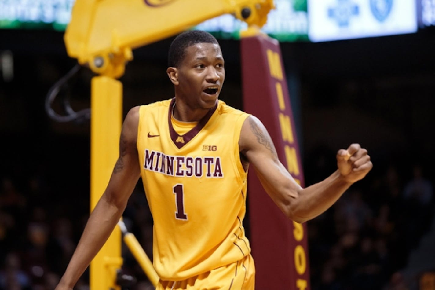 Dec 8, 2015; Minneapolis, MN, USA; Minnesota Gophers guard Dupree McBrayer (1) celebrates his basket in the second half against the South Dakota State Jackrabbits at Williams Arena. Mandatory Credit: Brad Rempel-USA TODAY Sports