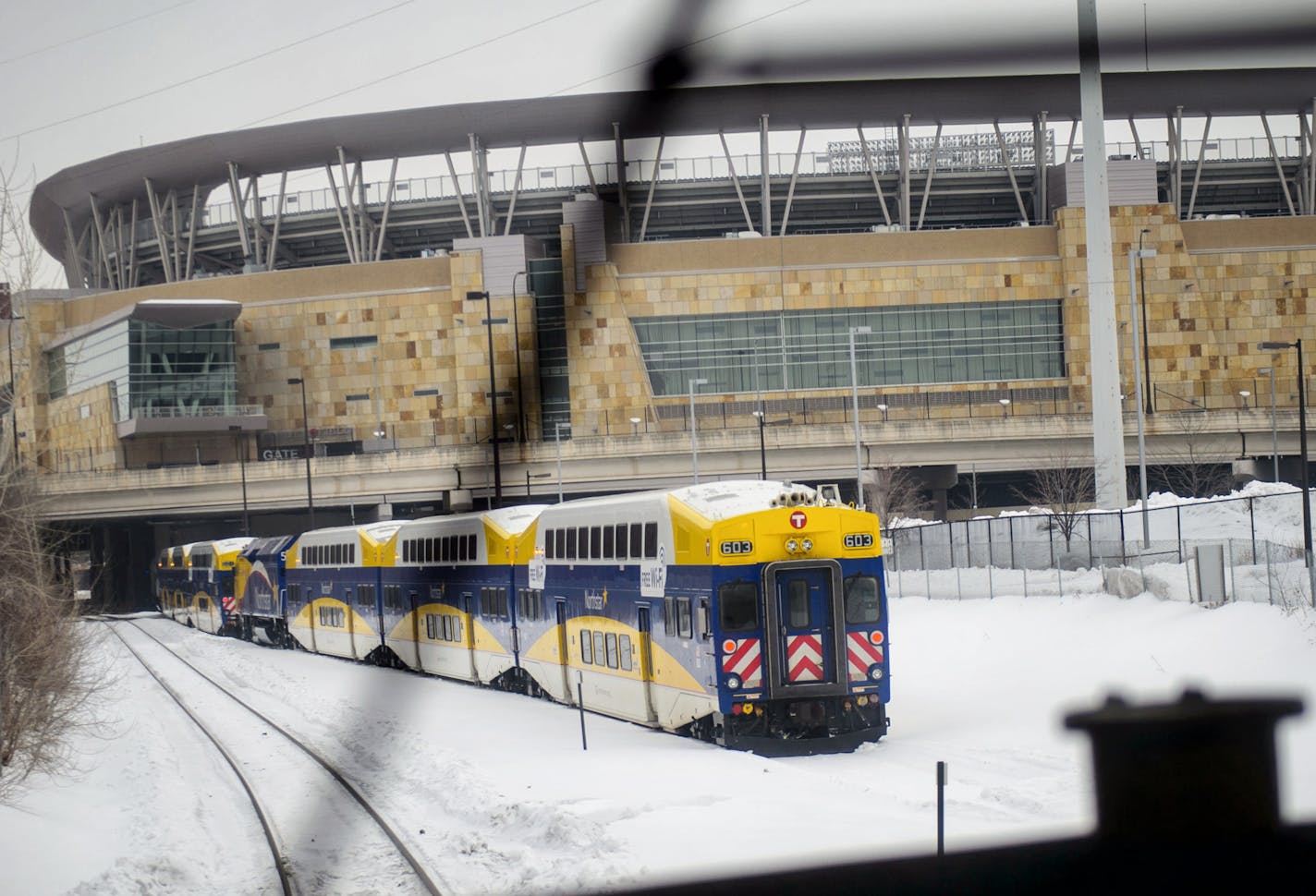 9:20 a.m. The train passed Target field where it also shares the rails with the Northstar Line. ] GLEN STUBBE * gstubbe@startribune.com Tuesday March 4, 2014. It's the small railroad that has caused big headaches for planners of the Southwest Corridor light rail. The Twin Cities & Western hauls corn, soybeans and ethanol from rural Minnesota to St. Paul, and is leery about moving its line to make room for the future light rail. We ride along on the little railroad with oversized clout in the con