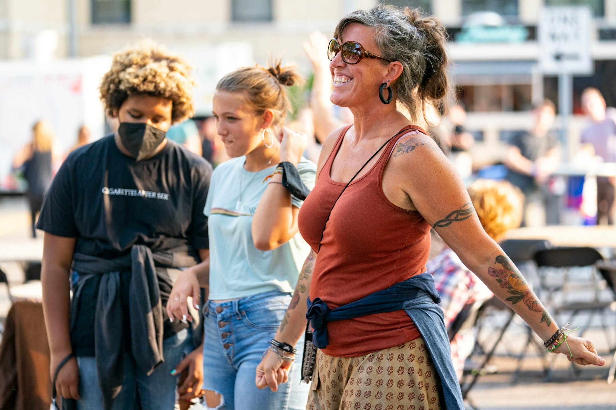 Jess Wood danced as she listened to Bora Jork perform on the AHA Sparkling Water Stage at the Basilica Block Party on Friday evening.