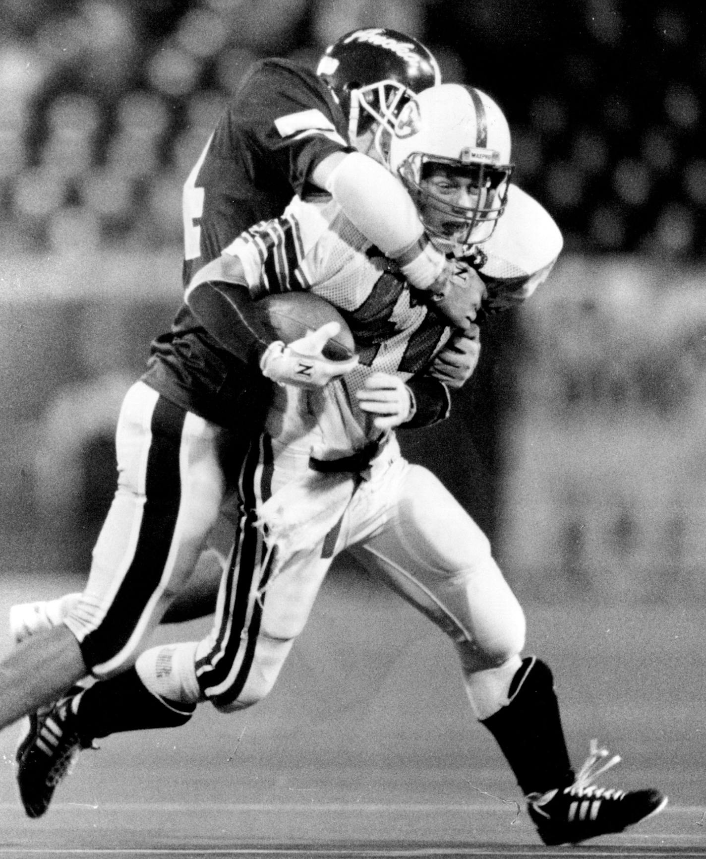 November 24, 1990 Anoka's John DesRoches caught Elk River running back Brian Reighard from behind late in the fourth quarter. Brian Peterson, Minneapolis Star Tribune