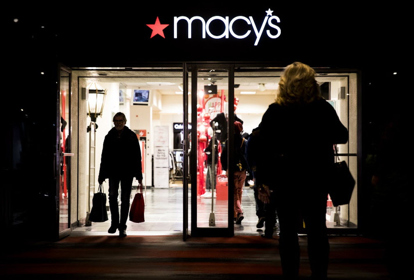 People walk in the skyway over Nicollet Mall in and out of Macy's in downtown Minneapolis. ] (Leila Navidi/Star Tribune) leila.navidi@startribune.com BACKGROUND INFORMATION: Macy's in downtown Minneapolis seen on Thursday, December 1, 2016. Rumor that Macy's in downtown Minneapolis will close this year.