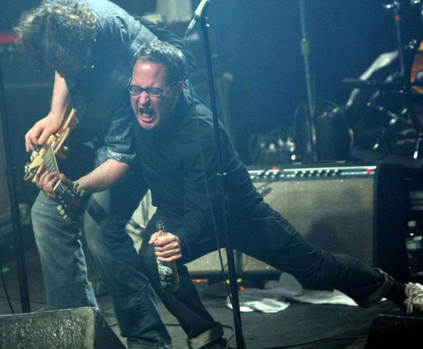 Craig Finn, front, with Patterson Hood during one of the Hold Steady's most memorable First Ave moments, a two-night stand with the Drive-by Truckers in 2008. / Star Tribune file