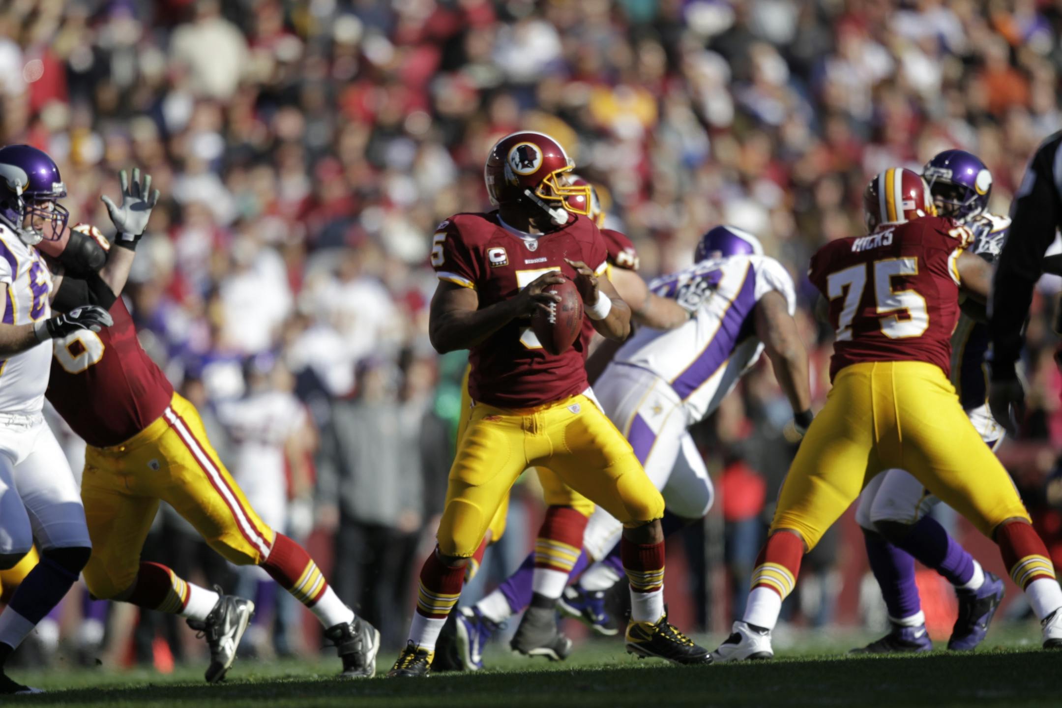 Redskins quarterback Donovan McNabb prepares to pass on a 83 yard drive that led to a touchdown.