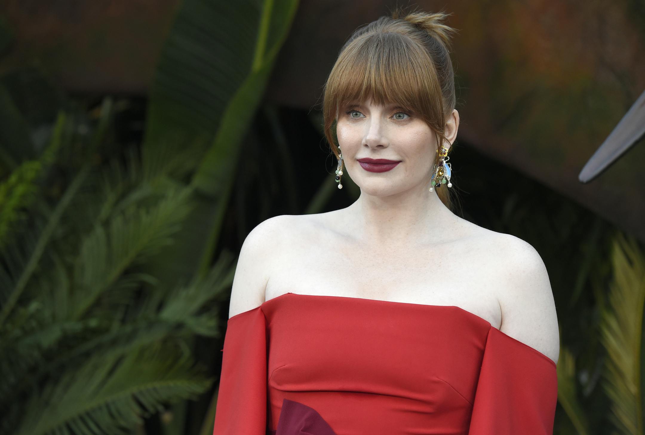 FILE -- In this Tuesday, June 12, 2018 file photo actor Bryce Dallas Howard arrives at the Los Angeles premiere of "Jurassic World: Fallen Kingdom" at the Walt Disney Concert Hall. Howard, an actor, producer and director, has been named 2019 Woman of the Year by Harvard University's Hasty Pudding Theatricals student group. (Photo by Chris Pizzello/Invision/AP, File)