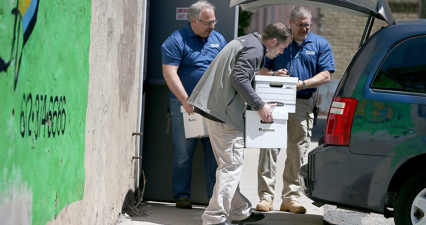 Officials from the DHS and BCA removed boxes and computer equipment from the Salama Child Care Center, Wednesday, May 13, 2015 in Minneapolis, MN.