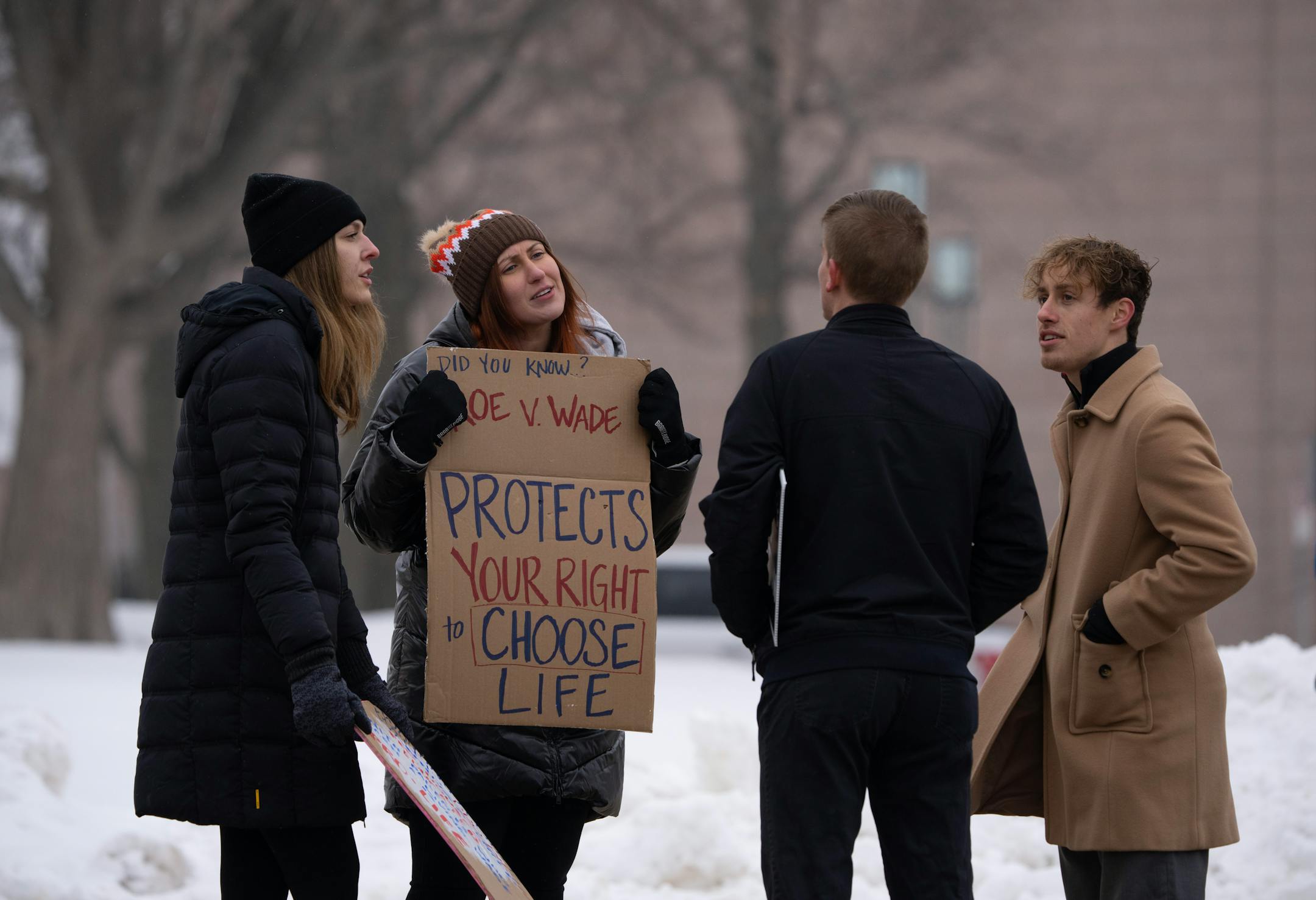 Two pro-choice advocates engaged people attending the Minnesota Citizens Concerned for Life 50th March for Life, the first since Roe was overturned at the State Capitol.