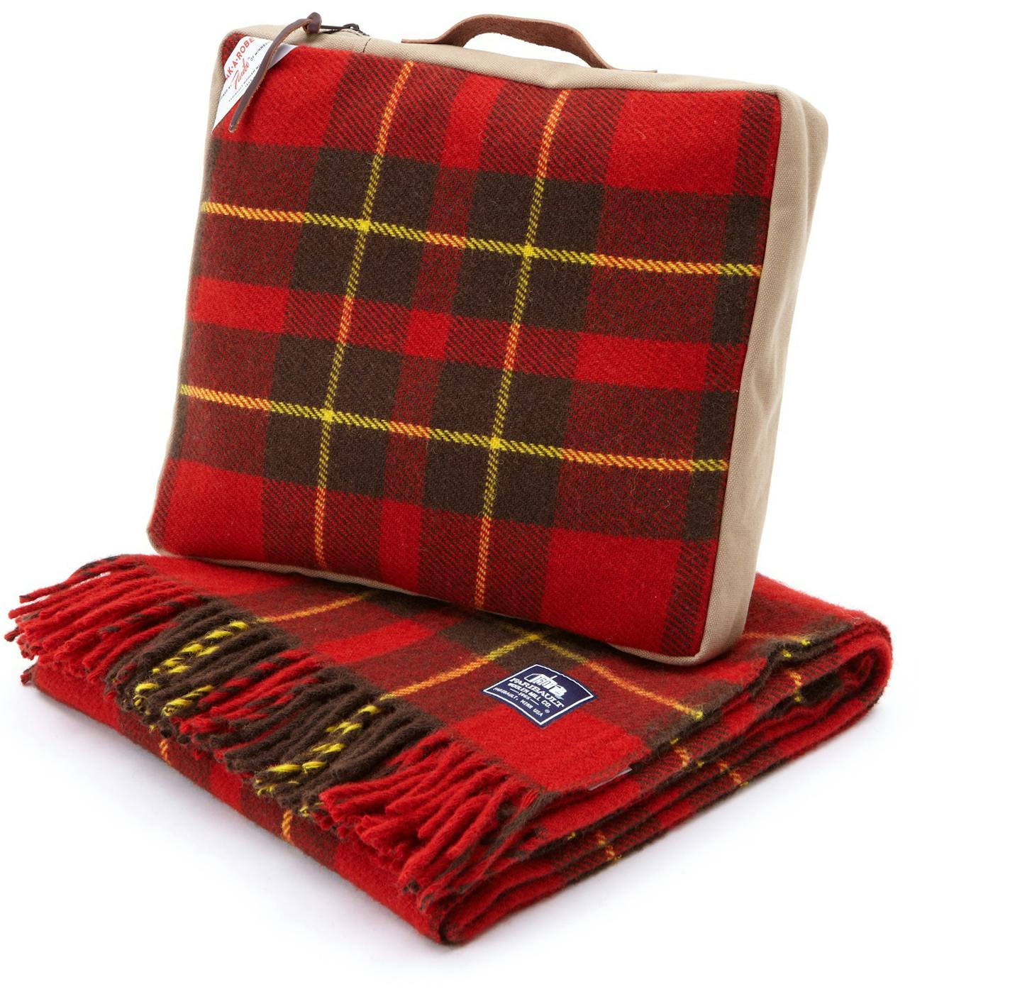 Faribault Woolen Mill's Pak-a-Robe in red combo. This collection was revived in 2015 for Faribault's 150th anniversary. The bag holds a wool blanket, but can also be used as a seat cushion.