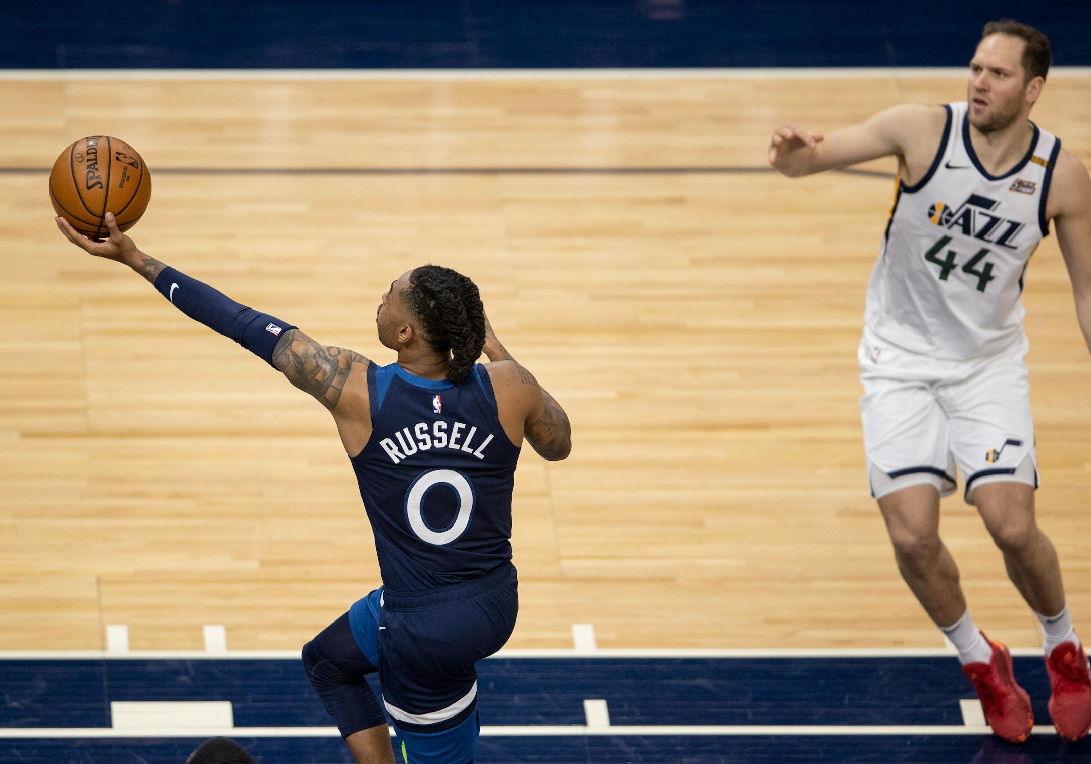 D'Angelo Russell (0) of the Minnesota Timberwolves made the go-ahead basket in the final seconds of the game as Bojan Bogdanovic (44) watched.