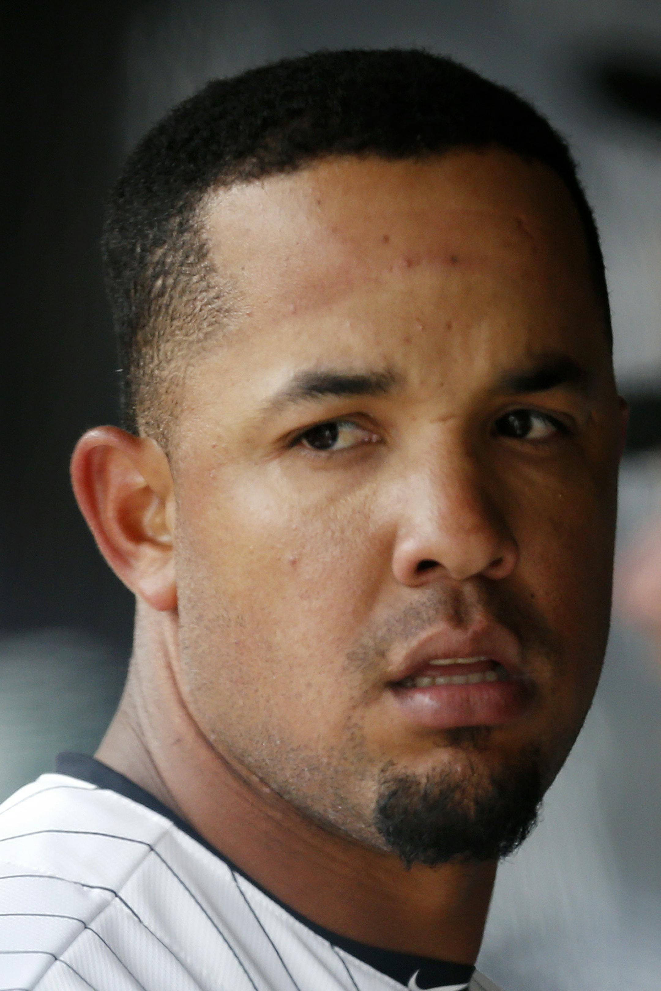Chicago White Sox first baseman Jose Abreu in the dugout during the eighth inning of a baseball game against the Minnesota Twins on Wednesday, April 2, 2014, in Chicago. The White Sox won 7-6 in 11 innings. (AP Photo/Andrew A. Nelles)