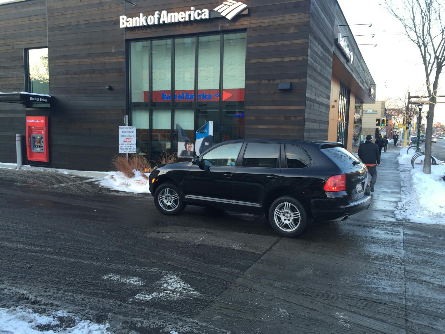 A new Bank of America branch on Hennepin Avenue in Uptown features a drive-through lane facing the sidewalk.