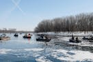Hundreds of anglers ply the Mississippi River near Red Wing in spring to seek walleyes amd saiger that swim upstream from Lake Pepin to spawn.