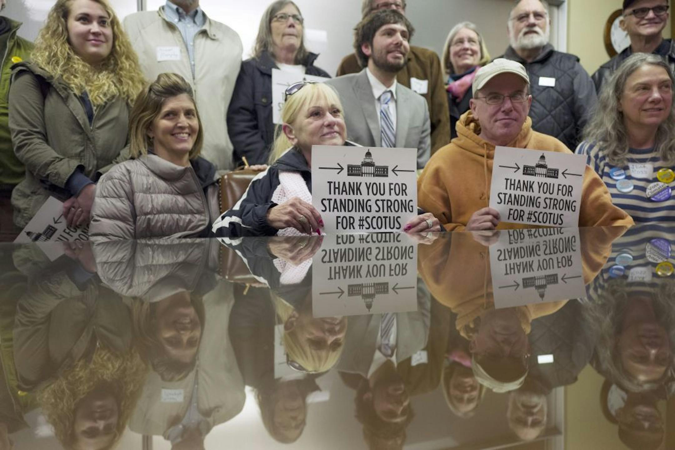 Constituents gathered at Sen. Al Franken office thanking him for standing with President Obama against Republican obstruction of a Supreme Court nomination Monday March 21, 2016 in St. Paul, MN.