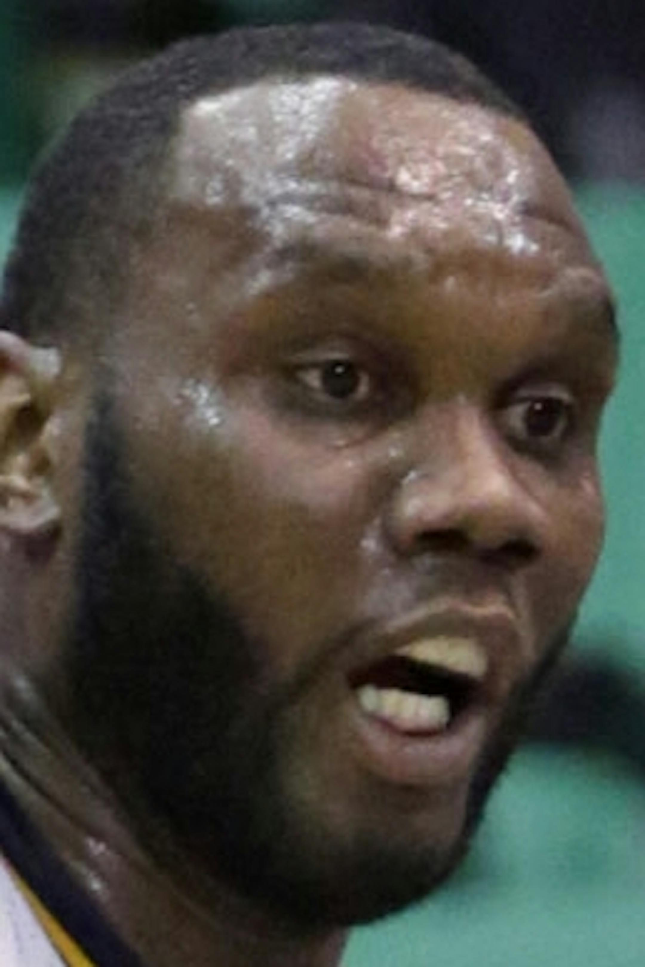 Utah Jazz's Al Jefferson (25) passes the ball as Minnesota Timberwolves' Greg Stiemsma, center, and J.J. Barea (11) defend in the first quarter during an NBA basketball game on Friday, April 12, 2013, in Salt Lake City. (AP Photo/Rick Bowmer)