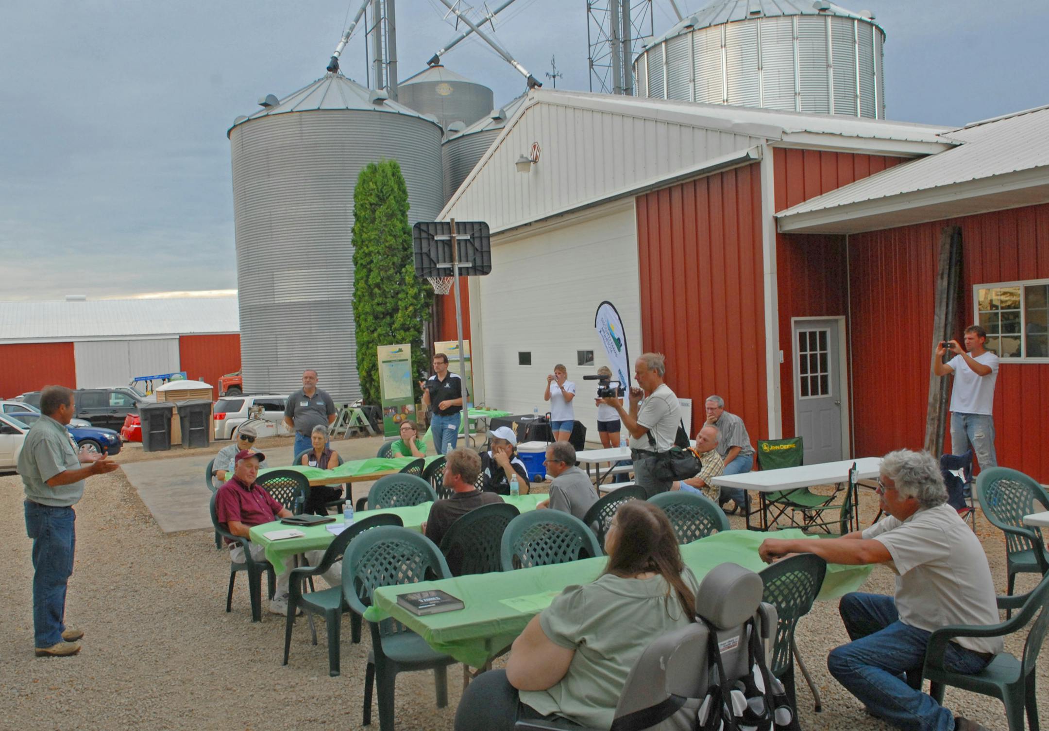 Ron Schara, host of the "Minnesota Bound'' television show and a retired Star Tribune outdoors columnist, was among hosts for a community gathering at the John Peterson farm near North Branch, Minn. , Wednesday evening. A Minnesota soybean farm group has contracted with Schara to highlight their conservation efforts, and Schara told the gathering Wednesday evening a balance between farm and wildlife interests is important.