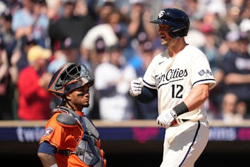 Kyle Farmer homered for the Twins when they played the Astros at Target Field on April 8.