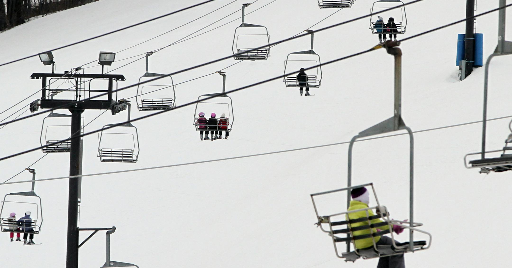 School kids rode the ski lift infront of the Hyland Lake Park Reserve ski chalet to the hill top on 2/7/12. Under a revised Three Rivers Park District proposal, ski hills would be improved, the chalet would be enlarged and parking would be expanded.] Bruce Bisping/Star Tribune bbisping@startribune.com