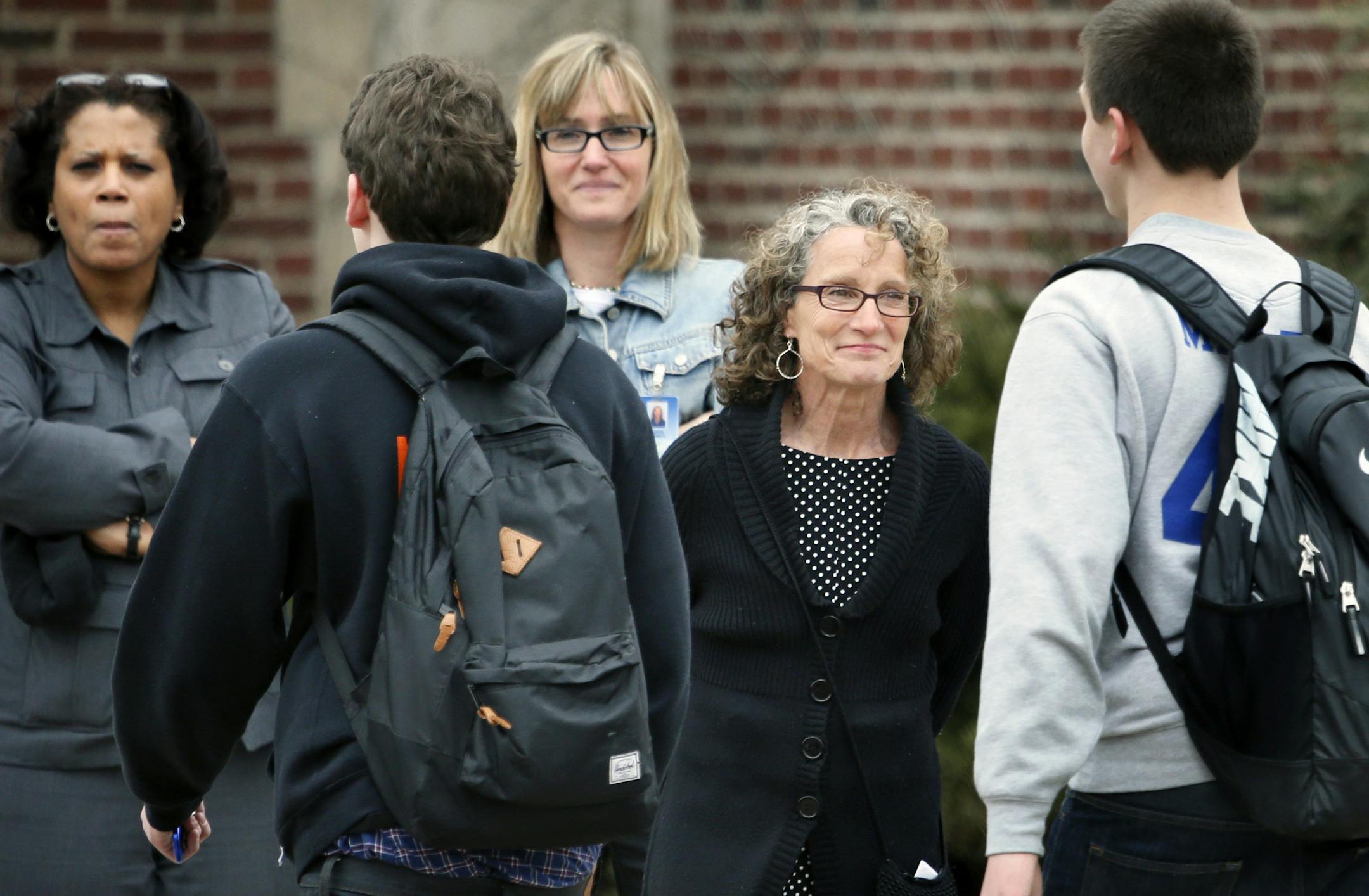 Hundreds of students poured out of Washburn High School early Monday afternoon in support of embattled school Athletic Director Dan Pratt. They gathered on the school's new synthetic turf field that Pratt and others raised money to buy and install. "We've got quite a group of kids," said Jamison Whiting, a senior four-sport athlete. Students and others involved with Washburn athletics said the issue involves whether Pratt obtained proper approvals for a scoreboard that was to be installed when t