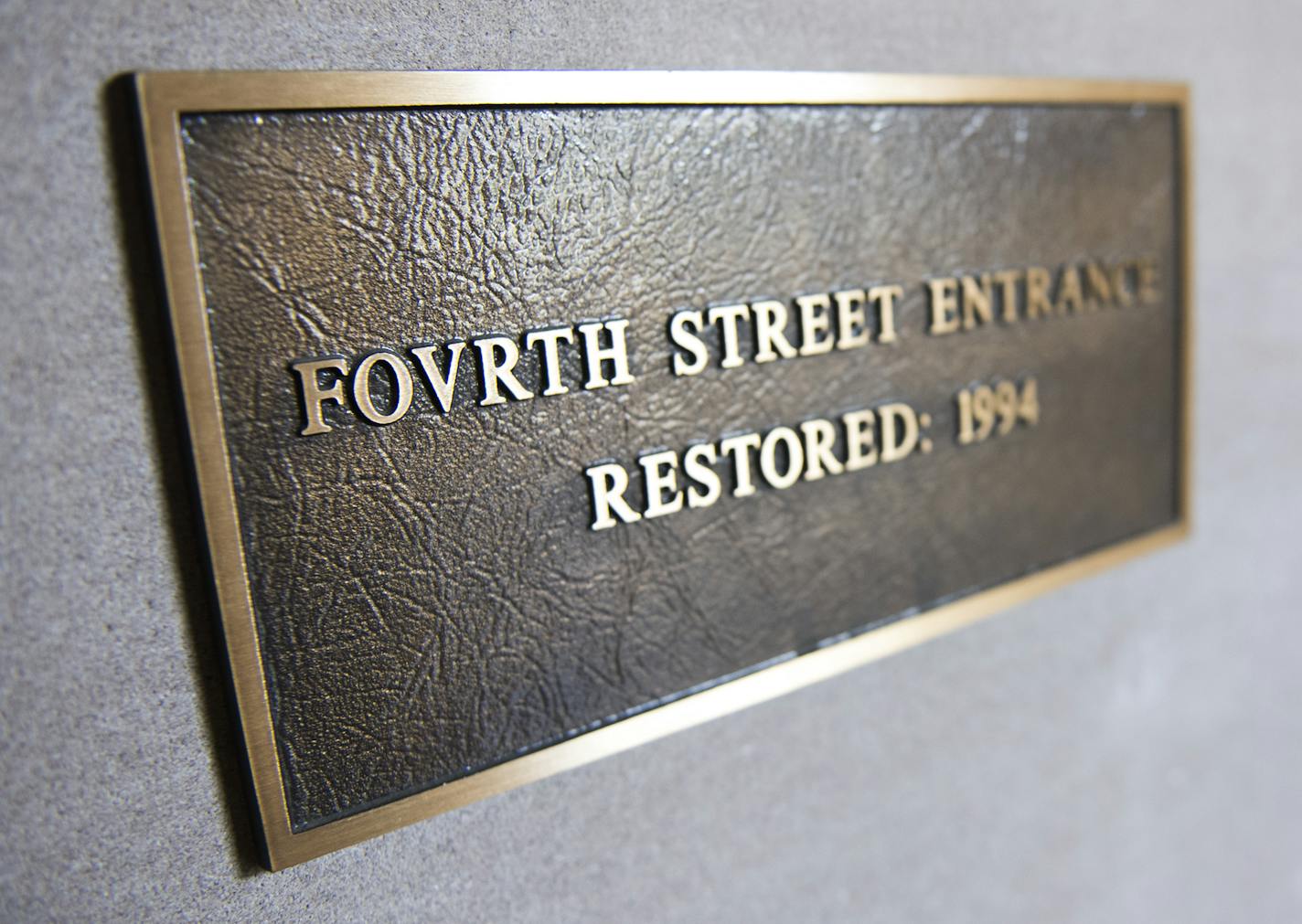 The plaque stating "Fovrth Street Entrance" in the entrance read along 4th Street is not spelled incorrectly, but was the old way the street was named. ] Isaac Hale &#x2022; isaac.hale@startribune.com Teresa Baker, of the Municipal Building Commission, gave a tour of the oddities and interesting facets of the Minneapolis City Council building on Monday, June 27, 2016.