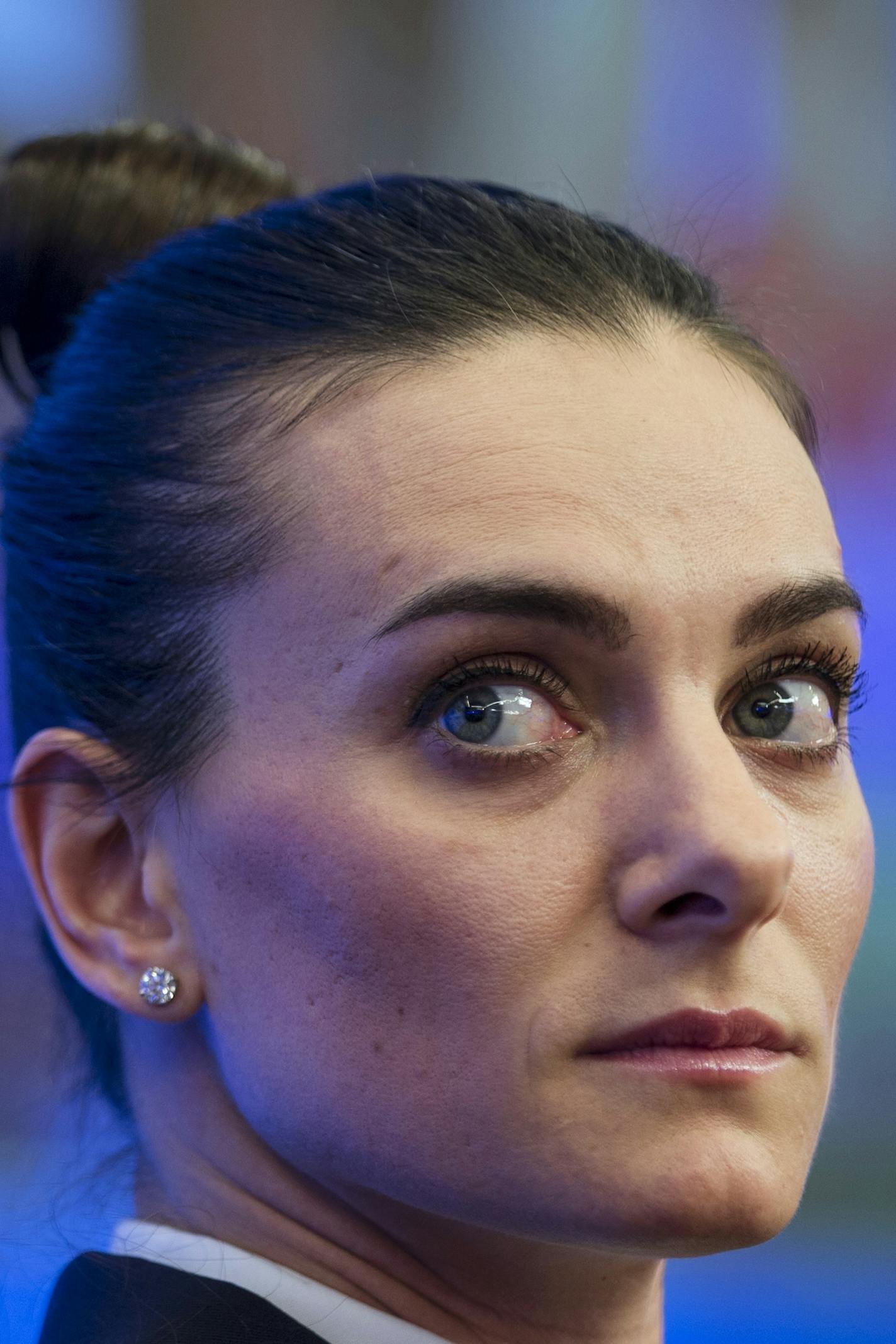 FILE - In this Thursday, Feb. 12, 2015 file photo, Russia's pole vaulter Yelena Isinbayeva attends a press conference in Moscow, Russia. Russia will learn on Friday, June 17, 2016 if its track and field athletes will be allowed to compete at the Rio de Janeiro Olympics, as more damning evidence of doping irregularities pour in. The latest WADA report on the obstruction of drug testing in Russia came shortly before the sport's governing body, the IAAF, decides whether to admit Russia's athletes t