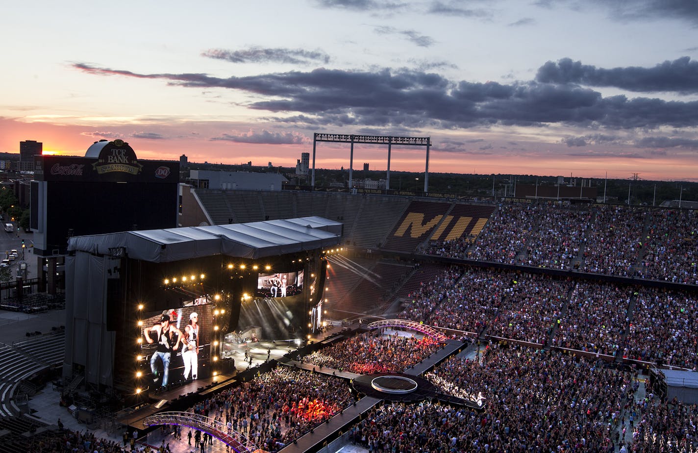 Florida Georgia Line performs as the sun sets at the Luke Bryan Kick The Dust Up Tour at TCF Bank Stadium in Minneapolis June 20, 2015. (Courtney Perry/Special to the Star Tribune)