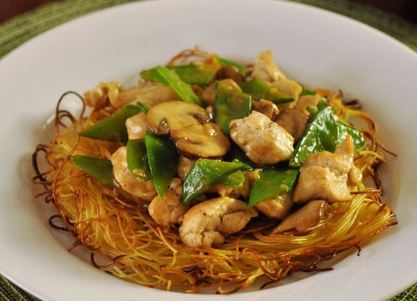 Photo by Meredith Deeds &#x2022; Special to the Star Tribune Stir-fry for healthy family.