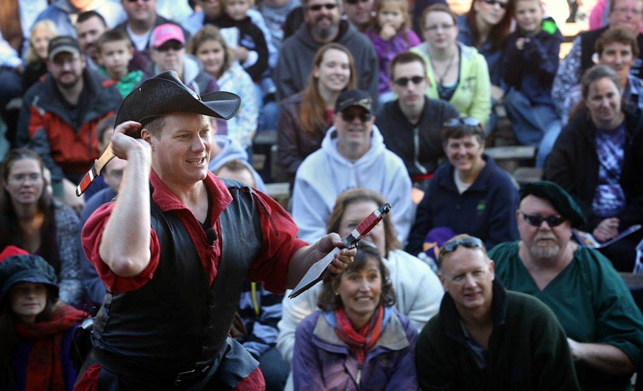 Caleb McEwen threw knives at the Renaissance Festival.