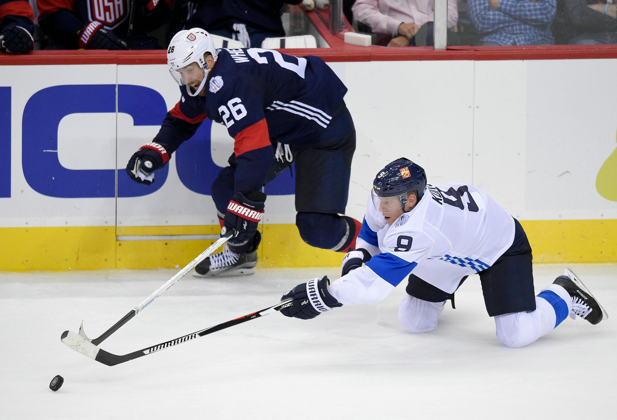 Finland (and Wild) forward Mikko Koivu (9) challenged U.S. (and former Breck and Gophers) forward Blake Wheeler (26) for the puck during the third period of an exhibition game Tuesday before the World Cup of Hockey. The United States won 3-2.