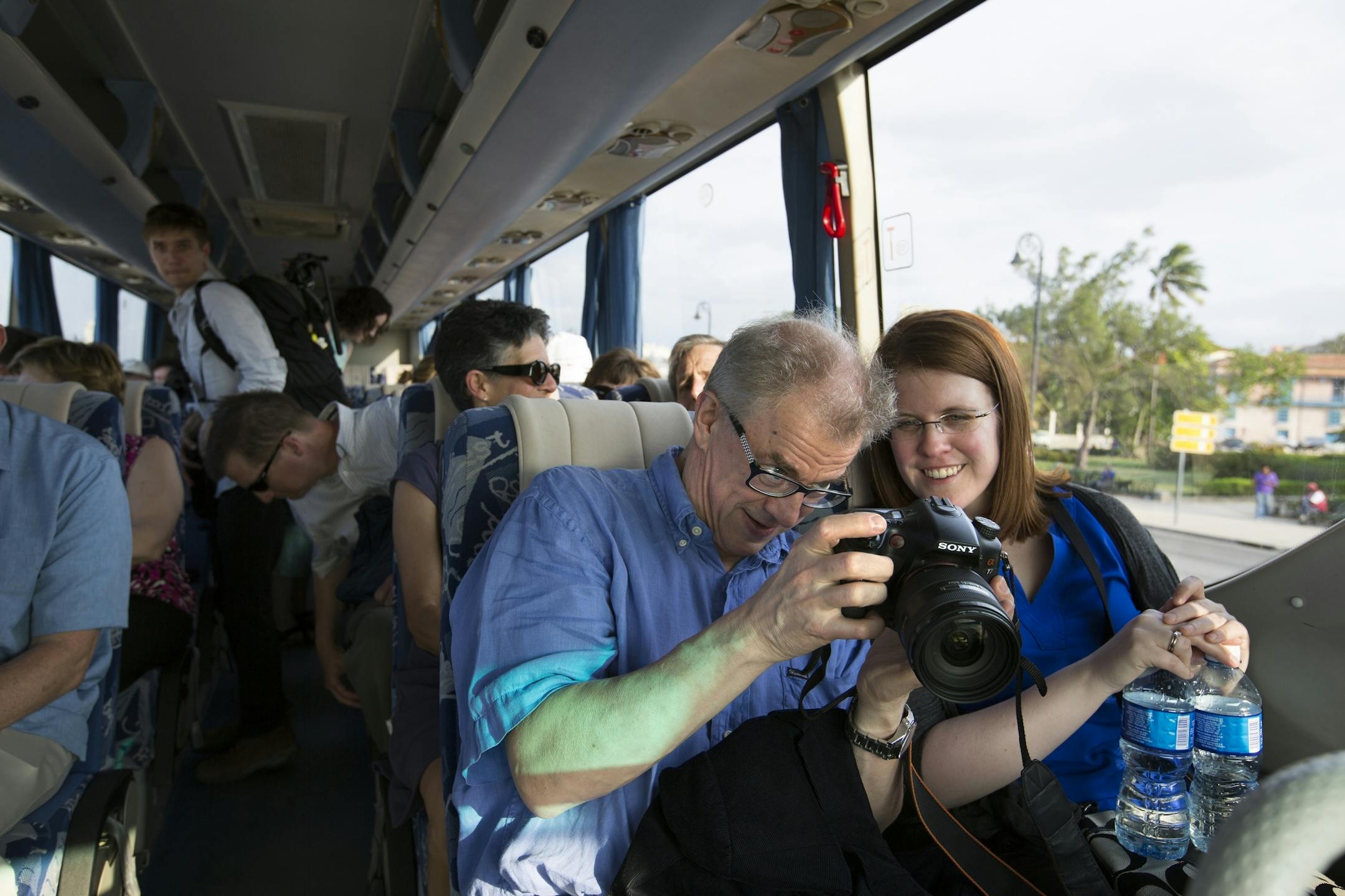 Minnesota Orchestra music director Osmo Vanska and concertmaster Erin Keefe check out their photos on the tour bus in Havana, Cuba on Wednesday, May 13, 2015.