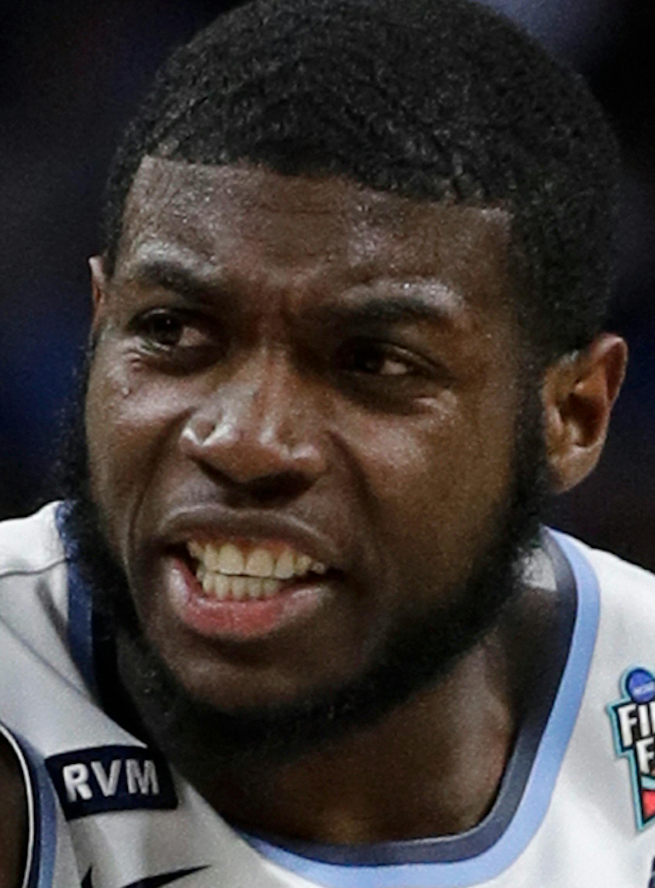 Villanova's Eric Paschall (4) reacts during the first half in the semifinals of the Final Four NCAA college basketball tournament against Kansas, Saturday, March 31, 2018, in San Antonio. (AP Photo/David J. Phillip)