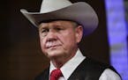 FILE - In this Monday, Sept. 25, 2017, file photo, former Alabama Chief Justice and U.S. Senate candidate Roy Moore speaks at a rally, in Fairhope, Al