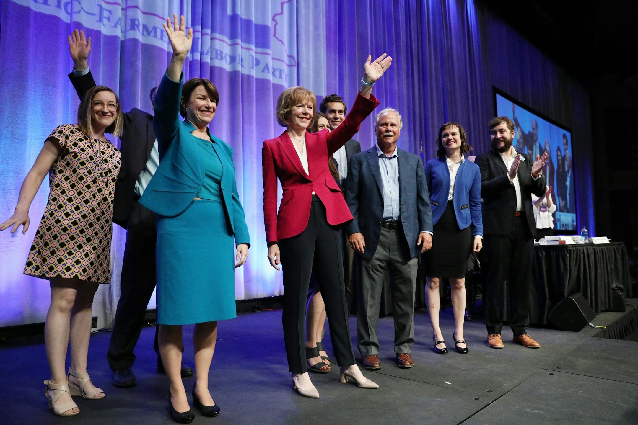 U.S. Sen. Tina Smith was joined by her family and U.S. Sen. Amy Klobuchar and her family on the stage after she accepted the party's endorsement during the DFL State Convention Friday.