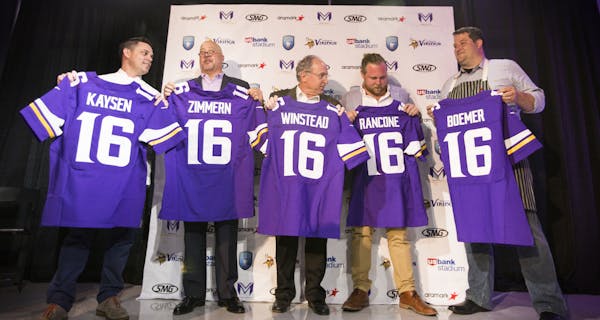 Newly announced U.S. Bank Stadium culinary partners stand for a photo op with their personalized Viking jerseys. From left is Gavin Kaysen, chef and o