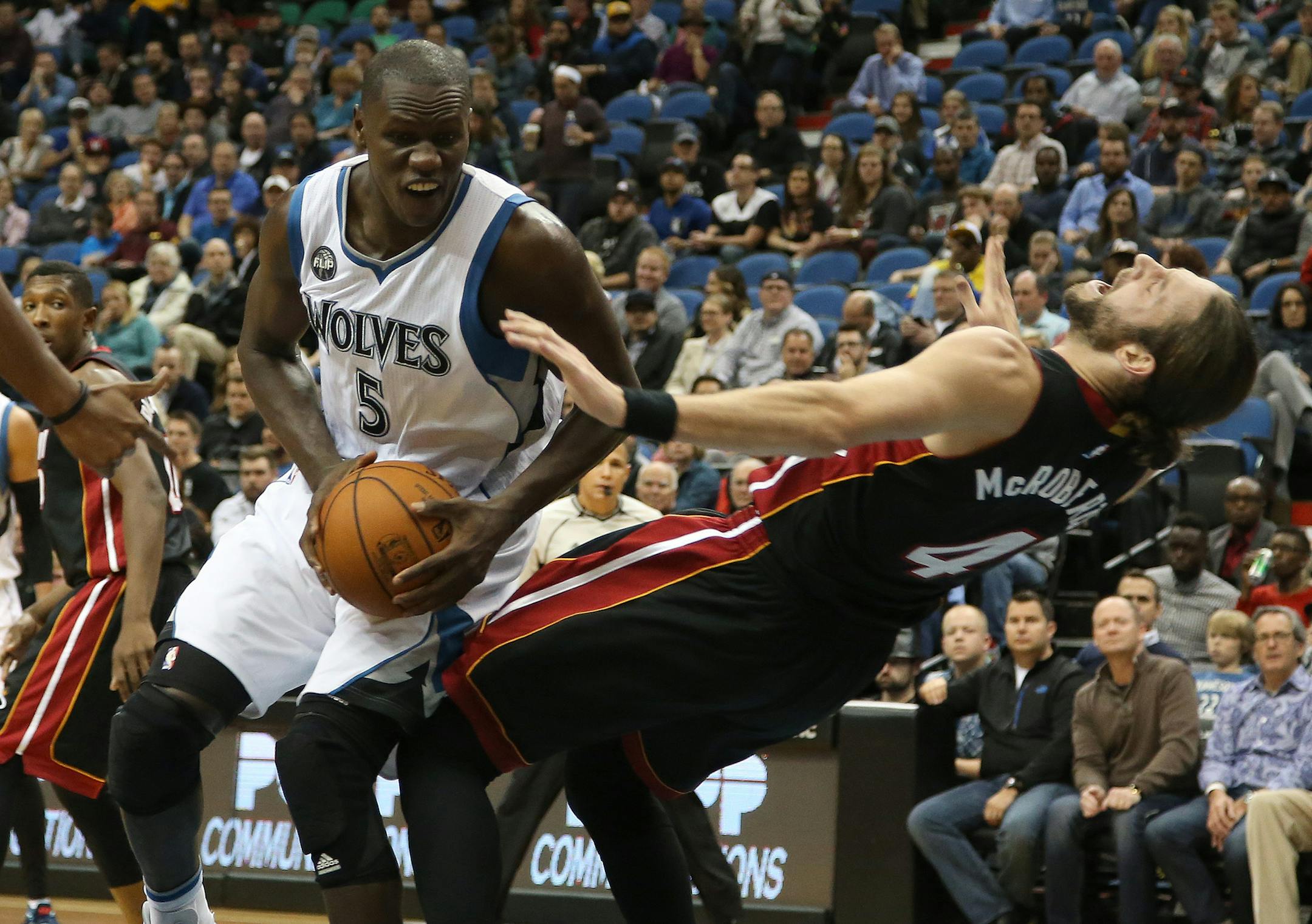 Wolves Gorgui Dieng got called for the offensive foul against Miami's Josh McRoberts during the first half. ] (KYNDELL HARKNESS/STAR TRIBUNE) kyndell.harkness@startribune.com Wolves vs Miami at the Target Center in Minneapolis Min., Thursday November 5, 2015.