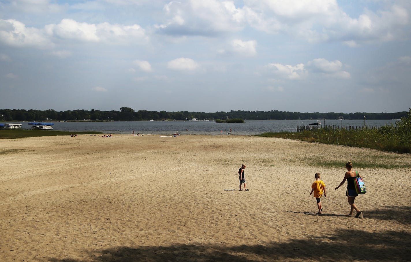 Aug. 29, 2013: Receding lake levels on White Bear Lake have level behind a giant sand beach at West Park Memorial Beach.