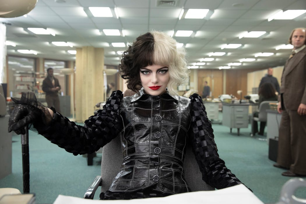 Emma Stone plays a fashionista who works for a design house in “Cruella.”