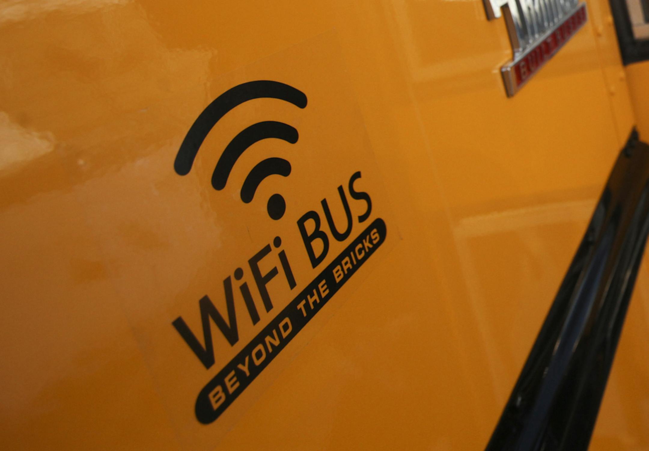 Chaska Middle School East eighth graders boarded a WiFi enabled school bus in Chaska Thursday, March 7, 20123, for a history competition in Robbinsdale, MN. Here, eighth grader Lauren Mattson walks off a bus, headed to the history competition.] (DAVID JOLES/STARTRIBUNE) djoles@startribune.com Forget snoozing or socializing. En route to athletic games or field trips, Chaska students can now do their online homework, upload photos from class field trips and read online documents straight from thei