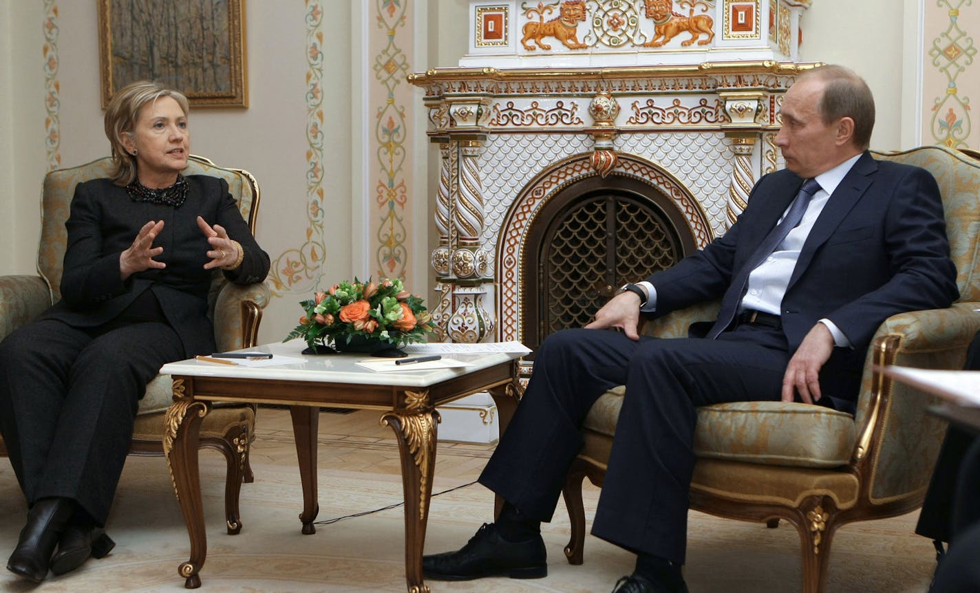 Russian Prime Minister Vladimir Putin, right, and U.S. Secretary of State Hillary Rodham Clinton seen during a meeting at the Novo-Ogaryovo just outside Moscow, Friday, March 19, 2010. U.S. Secretary of State Hillary Rodham Clinton said Friday that American and Russian negotiators are "on the brink" of agreement on a nuclear arms reduction treaty. (AP Photo/RIA-Novosti, Alexei Nikolsky, Pool) ORG XMIT: MOSB129