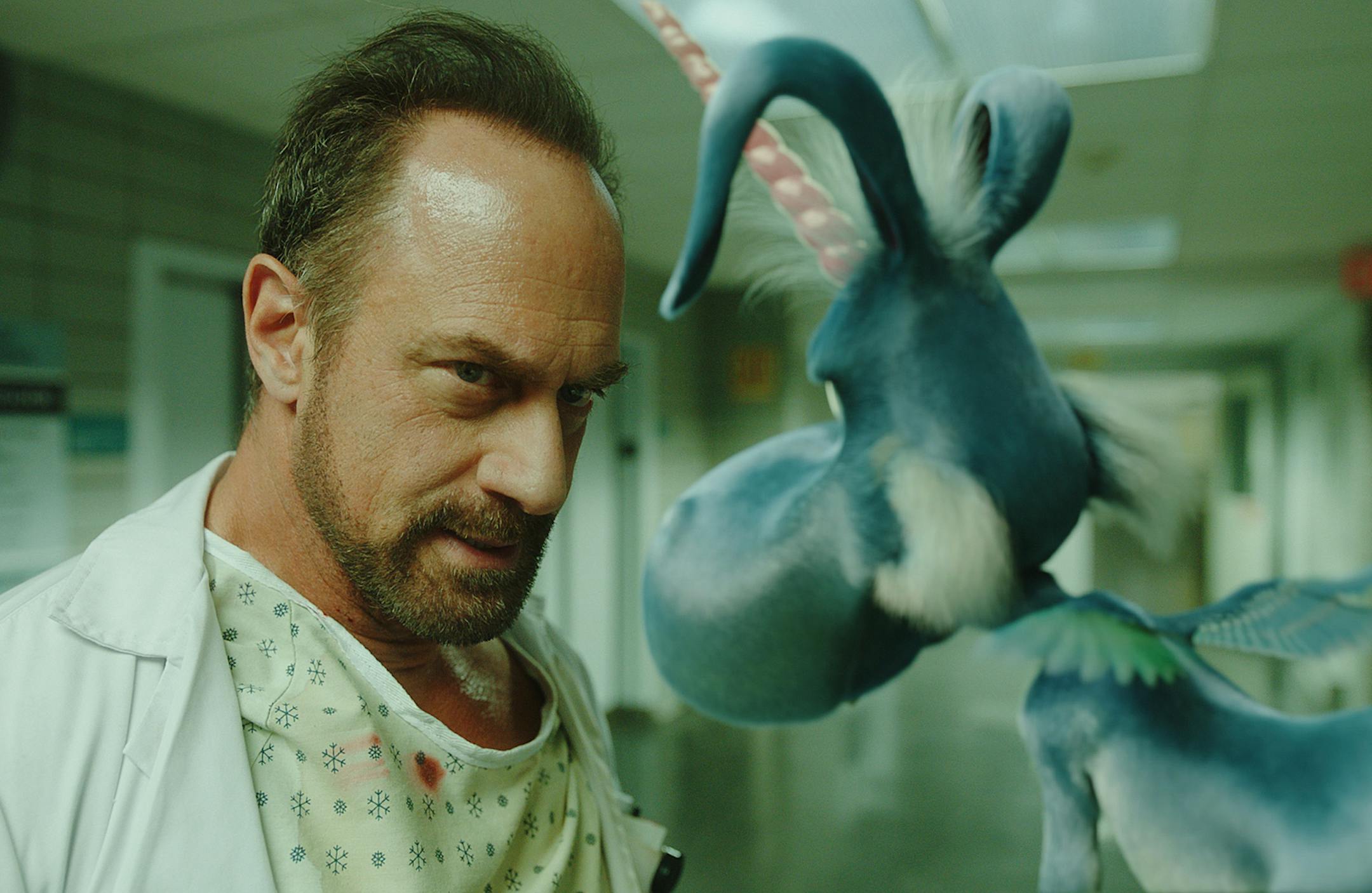 HAPPY! -- "Pilot" Episode 101 -- Pictured: (l-r) Chris Meloni as Nick Sax, Patton Oswald as Happy! -- (Photo by: Syfy) ORG XMIT: Season:1