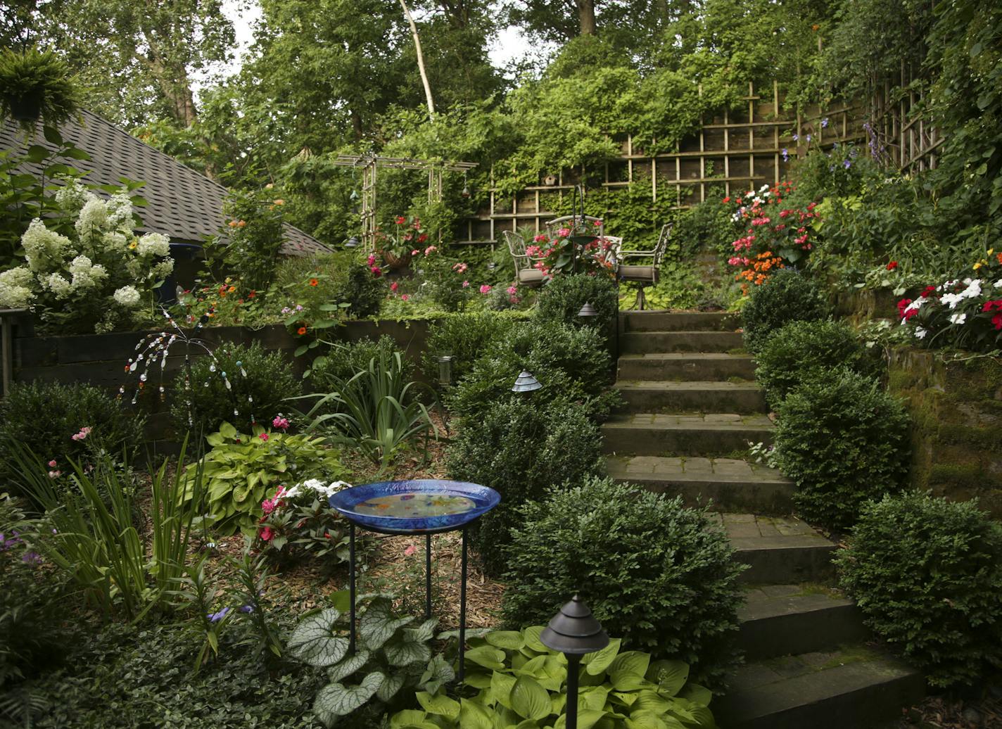 The secret terraced garden in Eagan is small in size but packed with color and points of interest.