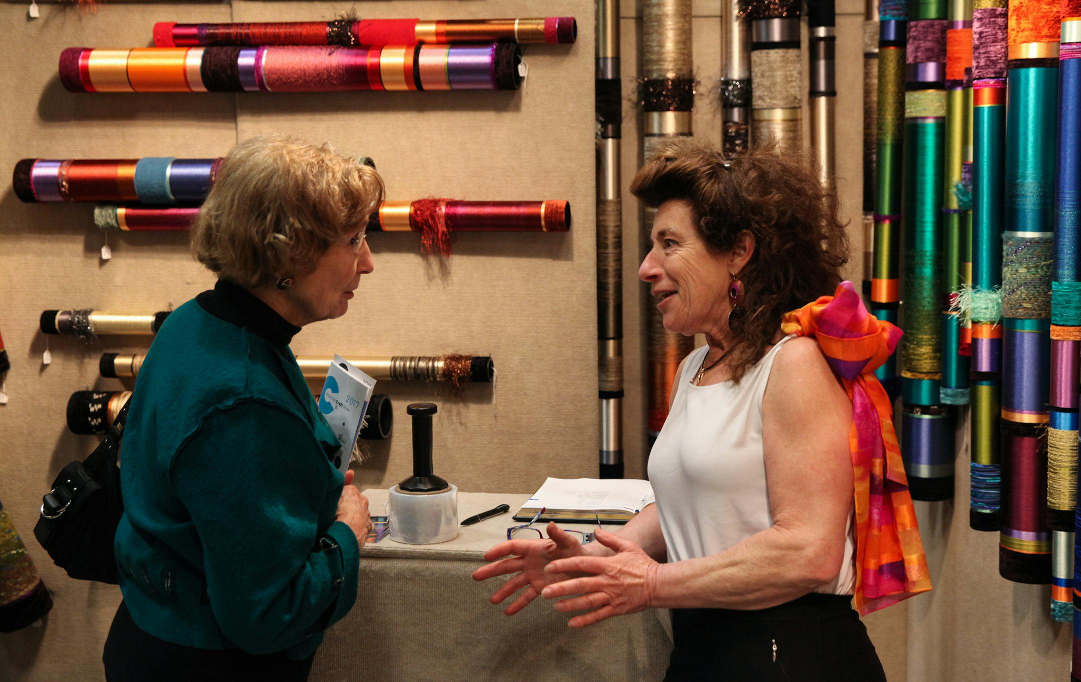 Myra Burg, the artist from California, is talking with Ruth Schuette about her artworks. ] XAVIER WANG • xavier.wang@startribune.com The American Craft Show returns to St. Paul on April 7th to 9th, 2017 at the RiverCenter in St. Paul, and more than 225 artists from the entire country attend the show.