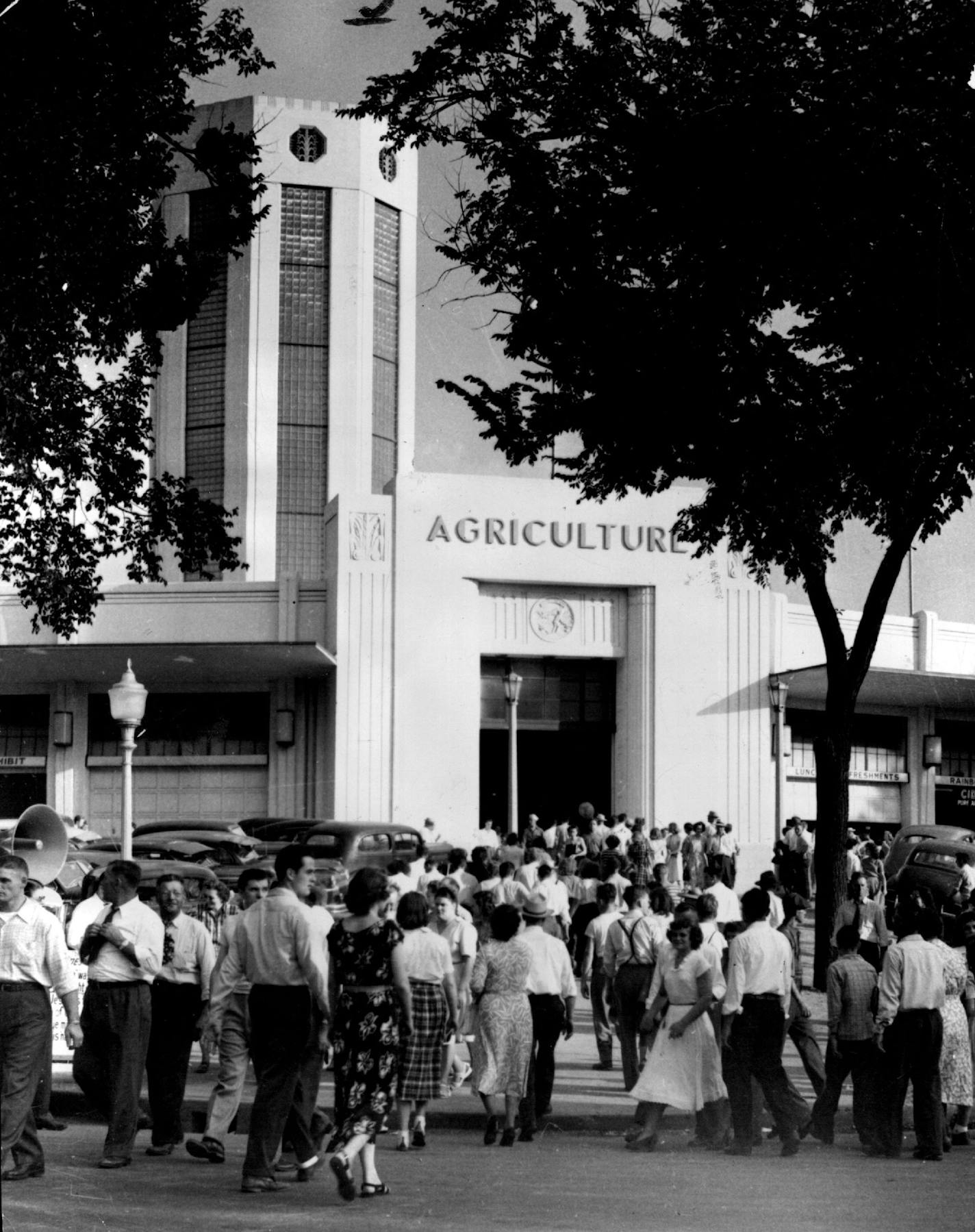 August 20, 1950 A Total of $12,700 is being offered this year by the agriculture department for top entries in the classes for potatoes, stock vegetables, seed grains, hay, corn and other produce. Also, two of the halls in the agriculture-horticulture building (left) will be devoted to agricultural exhibits by nearly one-third of the counties of the state. Kenneth M. Wright Studios; Minneapolis Star Tribune; Minneapolis Sunday Tribune