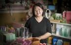 Happy Peach owner Kha Vang at her store in St. Paul's Hmong Village malll.