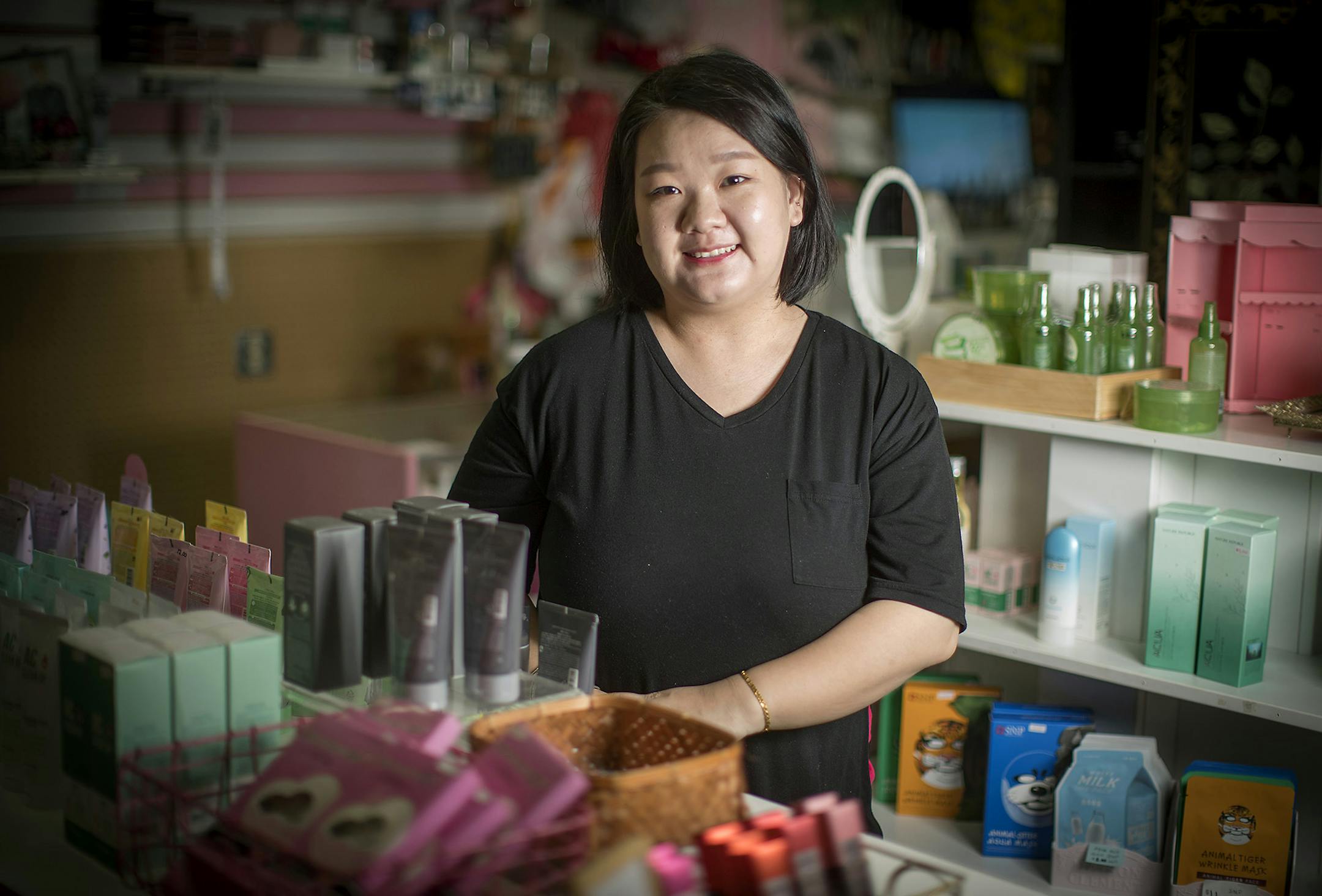 Happy Peach owner Kha Vang at her store in St. Paul's Hmong Village malll.