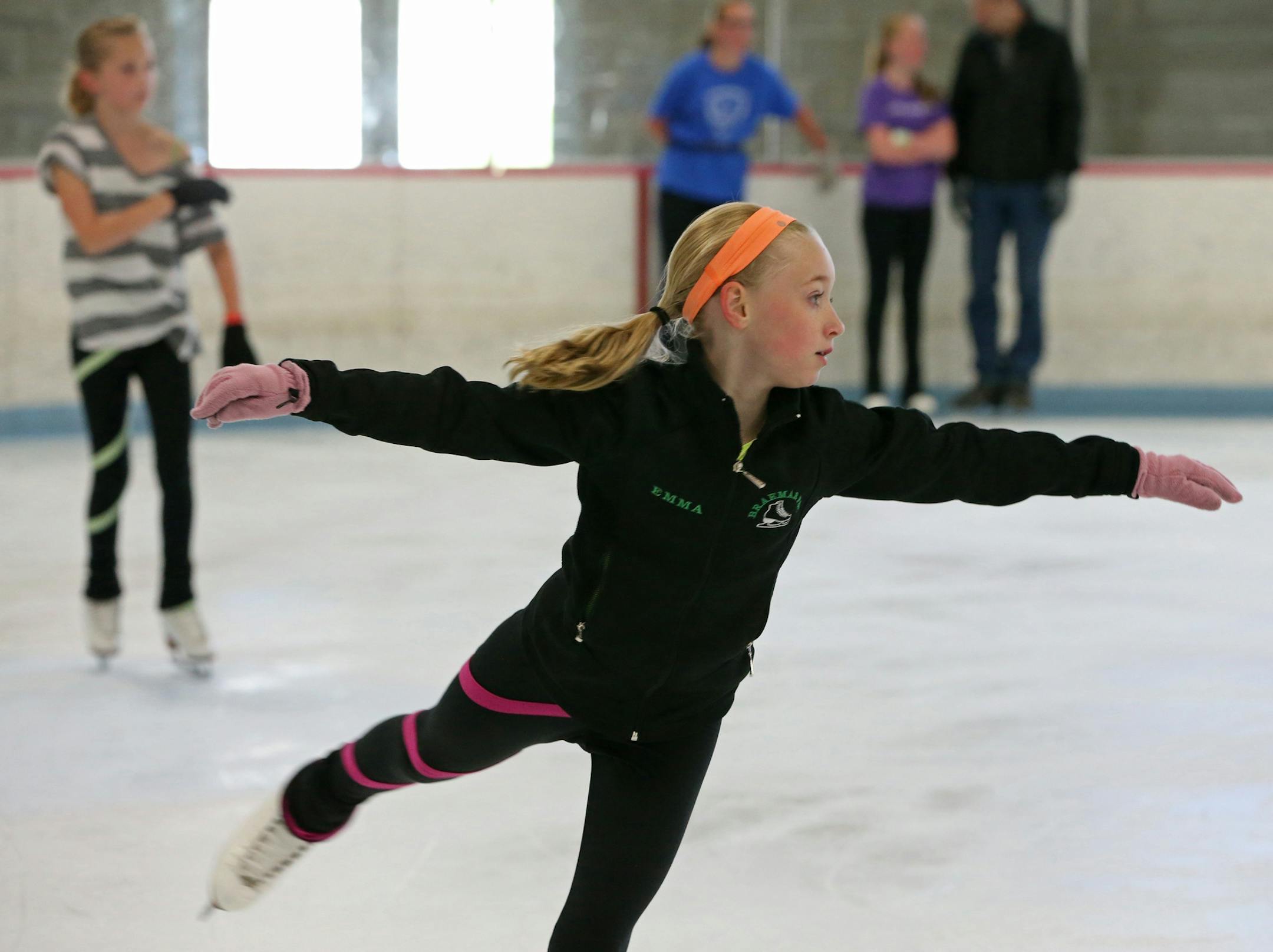 Emma Richards, age-10 practiced with her coach, Sarina David, at one of the rinks at Braemar Arena in Edina on 7/18/13. Skating may be skating, but it appears that in Edina hockey and figure skating do not mix. There's a proposal to cut the ice time of the Braemar City of Lakes Figure Skating Club because so many participants are not Edina residents, allowing more time for the Edina Hockey Association. The figure skating club is fighting the proposal, saying it would endanger the club's national